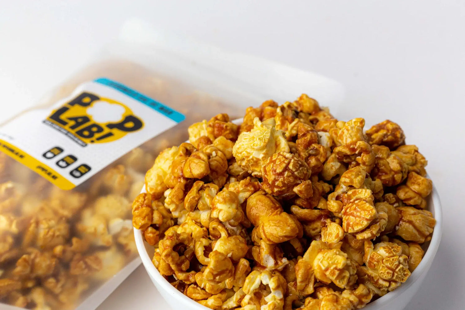 Bolsa palomitas caramelo sal de mar plato Pop Lab